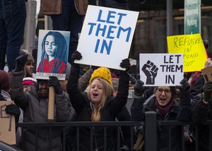 Protest at John F. Kennedy International Airport (JFK), Terminal 4, in New York City, against Donald Trump's executive order signed in January 2017 banning citizens of seven countries from traveling to the United States (the executive order is also known as "Protecting the Nation from Foreign Terrorist Entry into the United States").