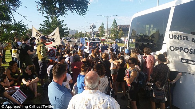 The protesters did their best to stop Q Society members from boarding a bus bound for a fundraising dinner 