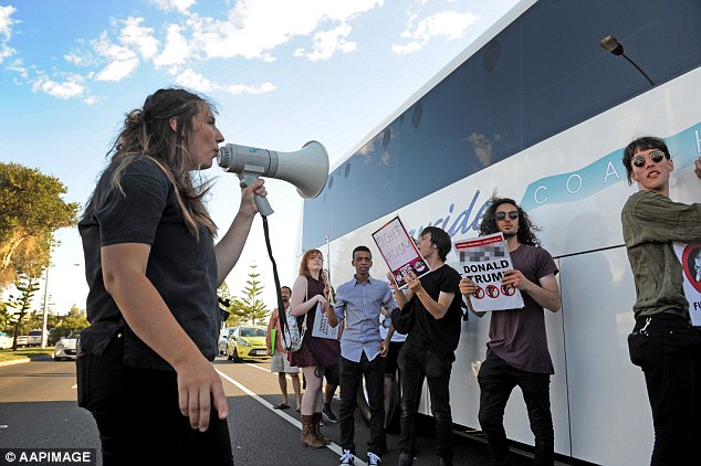 Protesters used loud speakers as well as banners to get their message across 