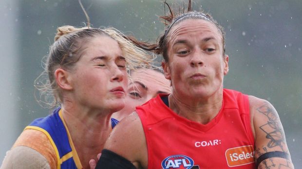 Mia-Rae Clifford (right) in action during the round 1 match between the Melbourne Demons and the Brisbane Lions at Casey ...