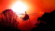 SPECIAL 000000 bushfire;020101;pic nick moir;smh;news;
pic shows elvis working in a blood red sky in maquarie park