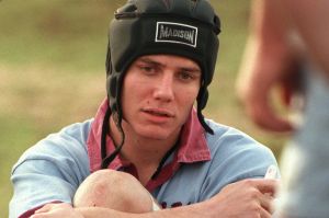 PICTURE-RICHARD BRIGGS....WALLABY FULLBACK STEPHEN LARKHAM STRETCHES AT HALF-TIME DURING HIS COMEBACK GAME AFTER INJURY ...