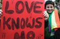 A gay-rights protester holds a banner in Beirut, Lebanon, in 2009.