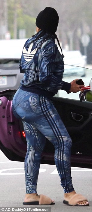 Dangerous curves ahead: On her lower half, Chyna wore leggings in the same swirly blue pattern which clung to her famed curves