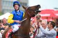 Brad Rawiller is all smiles after winning on Black Heart Bart in the C.F.Orr Stakes at Caulfield on Saturday.