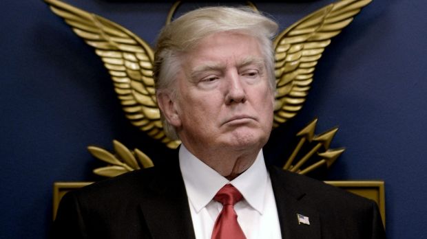 Donald Trump stands before signing executive orders in the Hall of Heroes at the Department of Defence in Arlington, ...