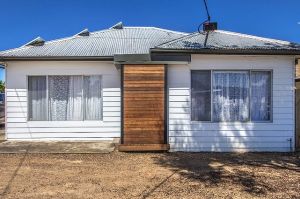 This three-bedroom weatherboard at 80 Alfrieda Street, St Albans, sold for a record $1.81 million. 