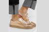 <b>Prada metallic leather sneakers</b><br>
Get her shoes that are both comfortable and stylish. Price: $690. Get the ...