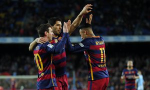 FC Barcelona's Neymar, right, celebrates a goal with his teammates Luis Suarez, center, and Lionel Messi against Celta Vigo during a Spanish La Liga soccer match at the Camp Nou stadium in Barcelona, Spain