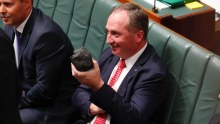 Barnaby Joyce holds a lump of coal in the House of Representatives