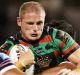 Crucial figure: George Burgess puts in a strong showing for Souths in their trial against Manly at Campbelltown Stadium.