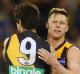 Trent Cotchin and Sam Mitchell.