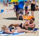 Queenslanders hit the beach in droves on Saturday.