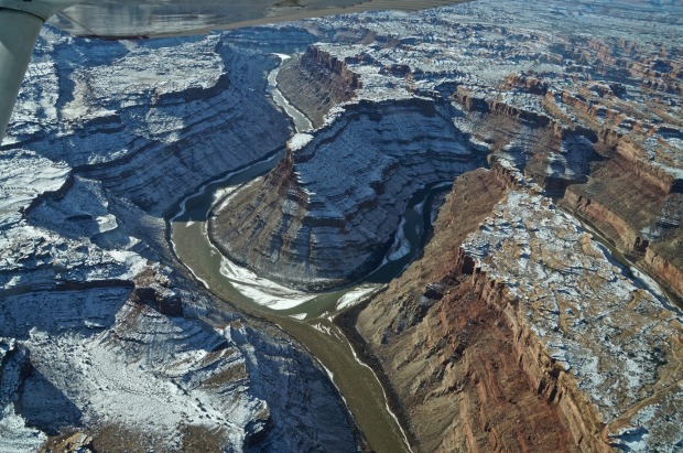 "The confluence of the Colorado & Green Rivers"...Photo taken January 2015...The polar vortex had covered the red ...