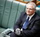 Treasurer Scott Morrison with a lump of coal during question time on Thursday.