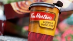 A Tim Hortons coffee cup is seen in New York on Wednesday, July 22, 2009. (AP / Seth Wenig)