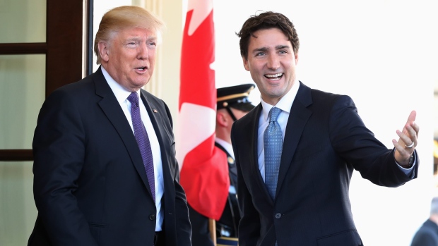 U.S. President Donald Trump greets Prime Minister Justin Trudeau upon his arrival at the White House in Washington, Monday, Feb. 13, 2017. (AP Photo/Andrew Harnik)