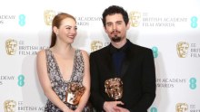 Actress Emma Stone and director Damien Chazelle with their BAFTAS