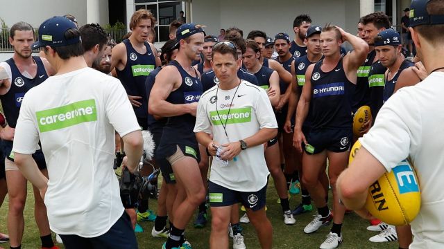 Carlton coach Brendon Bolton addresses his players during a training session.