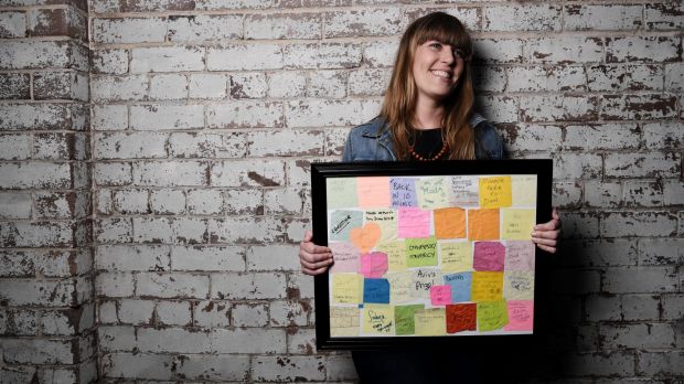 Artist Laura Sullivan and some of the notes she has found on the streets over the past 12 years. 