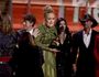 Adele accepts the award for album of the year for "25" at the 59th annual Grammy Awards 2017, in Los Angeles. (Photo by Matt Sayles/Invision/AP)
