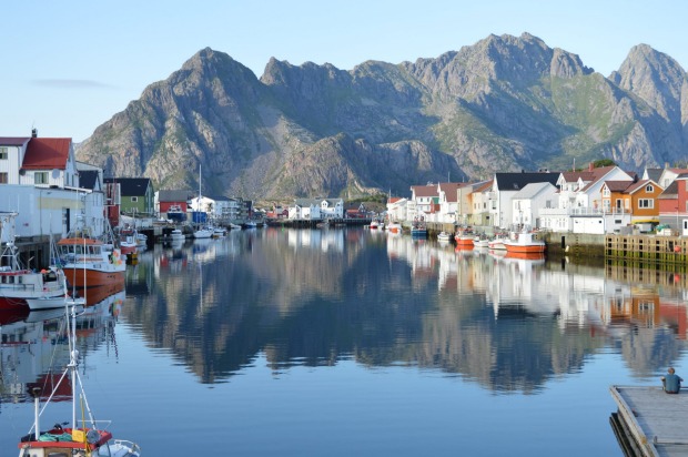 Late afternoon photo of Hennigsvaer - a beautiful town on the Flotan Islands in Norway's arctic circle.  The clarity of ...