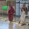 Villagers escape flooding in the Gaibandha district, Bangladesh in 2011