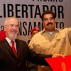 August 2013. Atilio Boron receives the Libertador prize from Venezuelan president Nicolas Maduro