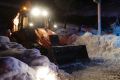 A snow-plough and an Italian Red Cross car are seen in the town of Farindola, central Italy, Thursday, Jan. 19, 2017. ...