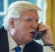 US President Donald Trump speaks on the phone with Vladimir Putin.