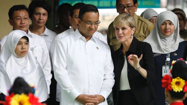 Anies Baswedan listens to Julie Bishop in the Jakarta suburb of Menteng in March 2016, when he was a minister in the ...