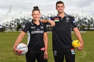 MELBOURNE, AUSTRALIA - FEBRUARY 14: Collingwood captain Scott Pendlebury and Madi Robinson, captain of the Collingwood ...