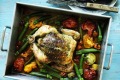 Herb butter roast chicken with summer vegetables.