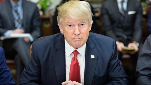 U.S. President Donald Trump waits for a lunch meeting in the Roosevelt Room of the White House, Washington D.C., February 2, 2017.
