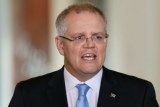 Federal Treasurer Scott Morrison speaks to the press.