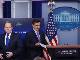 In this Feb. 1, 2017, file photo, National Security Adviser Michael Flynn walks past White House press secretary Sean Spicer to the podium to speak during the daily news briefing at the White House, in Washington.