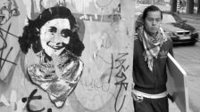 Graffiti of Anne Frank in a keffiyeh in Amsterdam. 