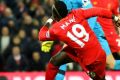 To the double: Sadio Mane of Liverpool scores his side's second goal against Tottenham Hotspur.