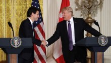 President Donald Trump shakes hands with Canadian Prime Minister Justin Trudeau