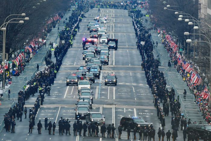 President Barack Obama and President-elect Donald Trump's motorcade drives down Pennsylvania Avenue