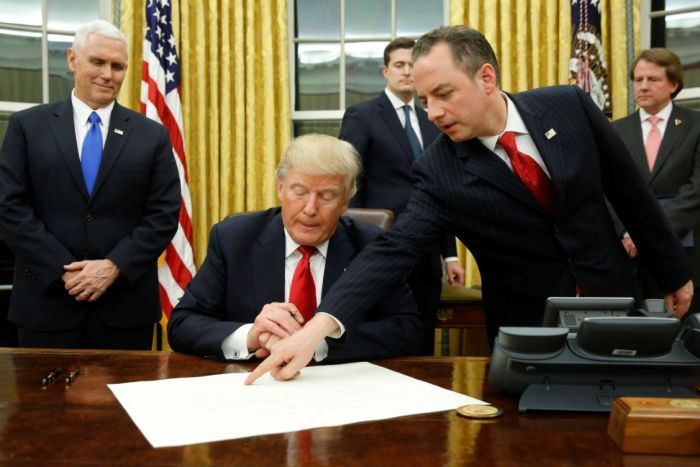 Donald Trump makes his first signing in the Oval Office, confirming James Mattis as his Secretary of Defence.