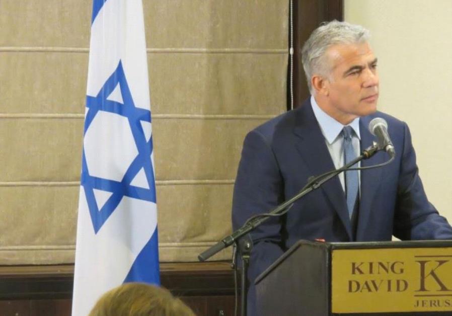 Yair Lapid at a meeting with the Foreign Press Association at Jerusalem’s King David Hotel.