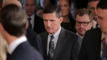 Michael Flynn arrives at a news conference