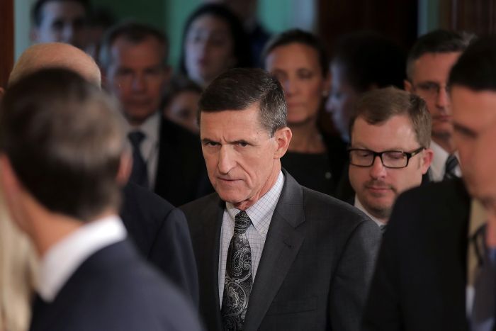 Michael Flynn arrives at a news conference