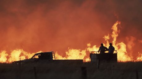 Farmers battle a fire near Cassilis in the central west of New South Wales.