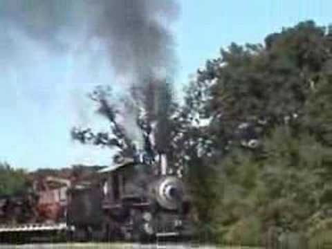 Soo Line steam train locomotive 353 barks up hill at  Rollag MN