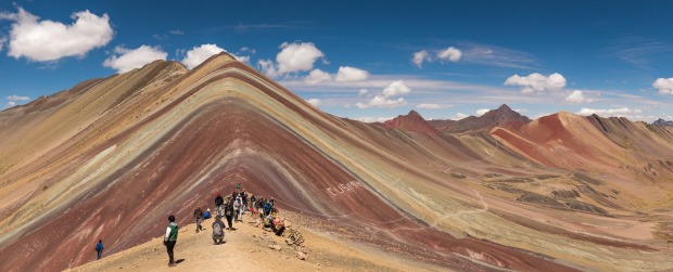 Vinicunca Mountain (Rainbow Mountain) Peruvian Andes. The climb to get here is a challenge but well worth it to stand ...