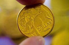 The Australian dollar briefly broke through US77 cents to a three-week high.