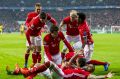 Bayern celebrate their fourth goal.