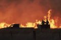 Farmers battle a fire near Cassilis in the central west of New South Wales.